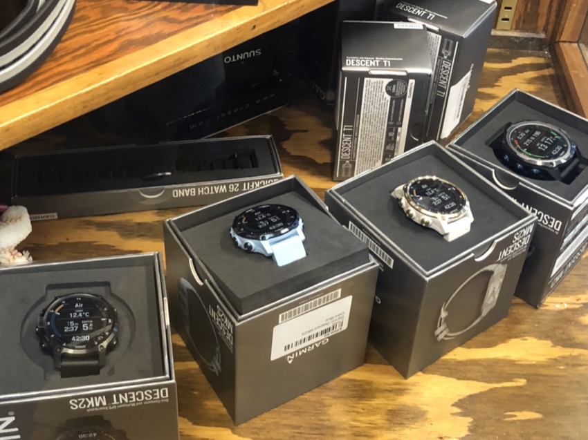 dive watches in a display case
