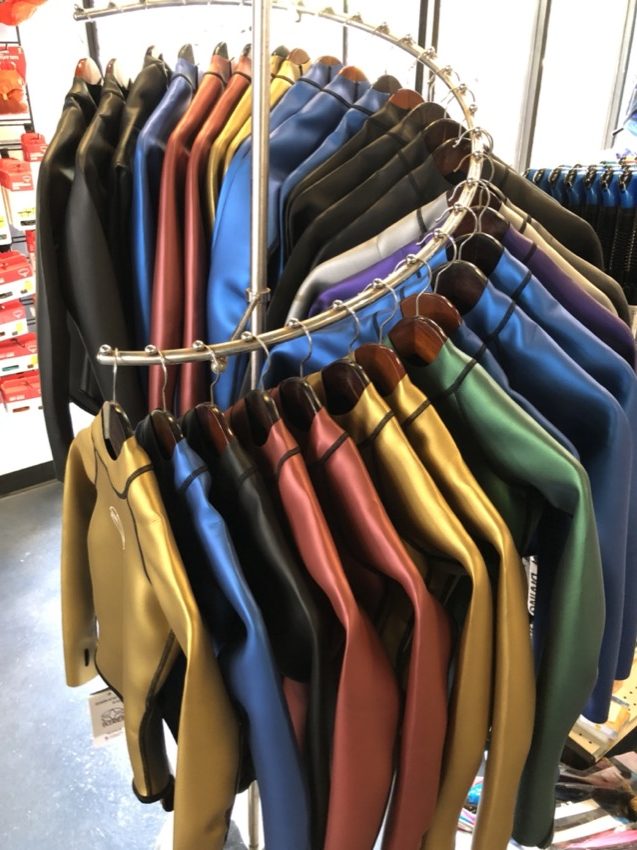 oceaner springs suits on rack display