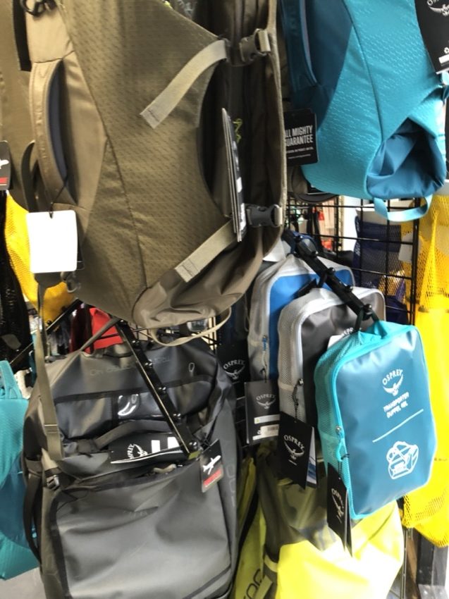 Osprey bags hanging from display