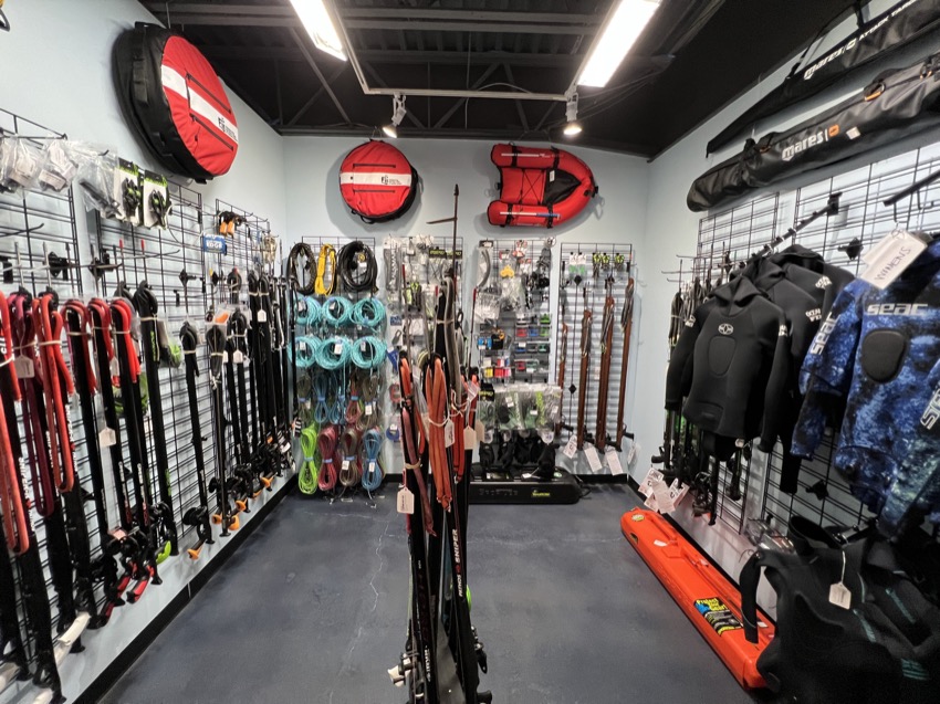 spearfishing gear section in a dive shop