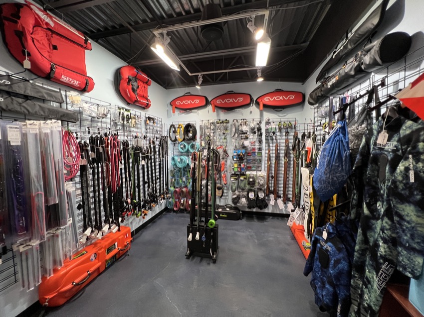 inside of Kona Honu Divers dive shop spearfishing section