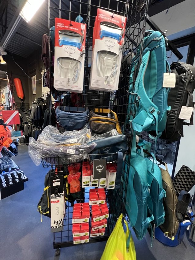 bags displayed inside a dive shop