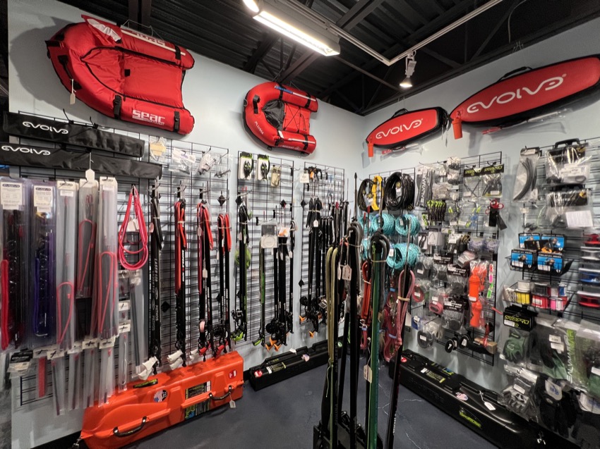 spearguns products displayed inside a dive shop