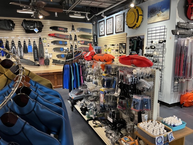 inside of dive shop with lots of products on display