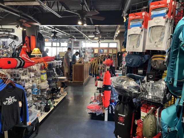 inside of dive shop with lots of products on display