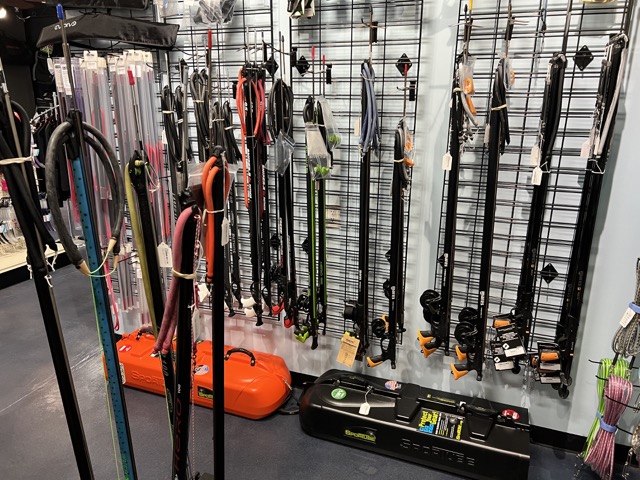spearfishing gear in a dive shop