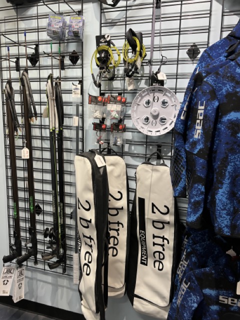 Freedive gear hanging on a wall