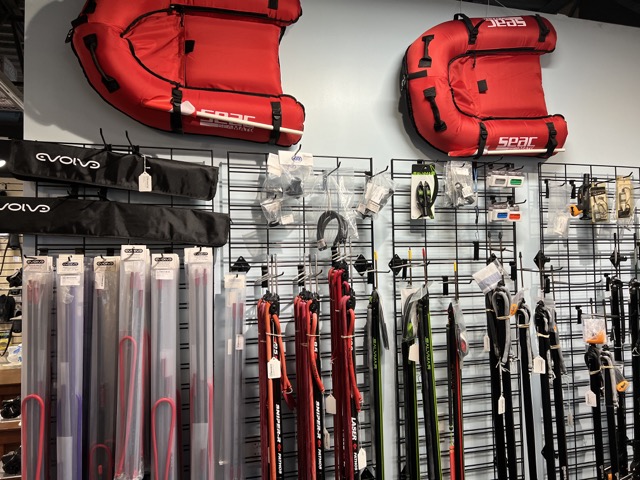lots of spearfishing gear inside a dive shop
