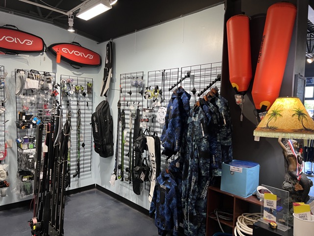 inside a dive shop spearfishing section