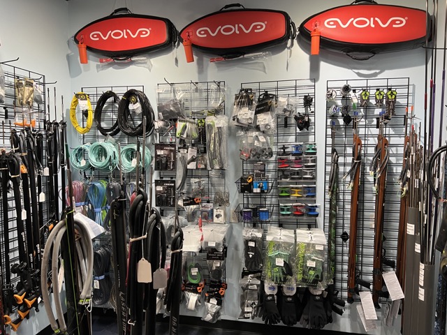 a wall full of spearfishing gear