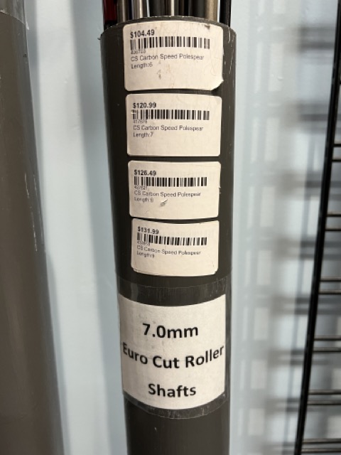 price tags on a tube showing prices for spearfishing shafts
