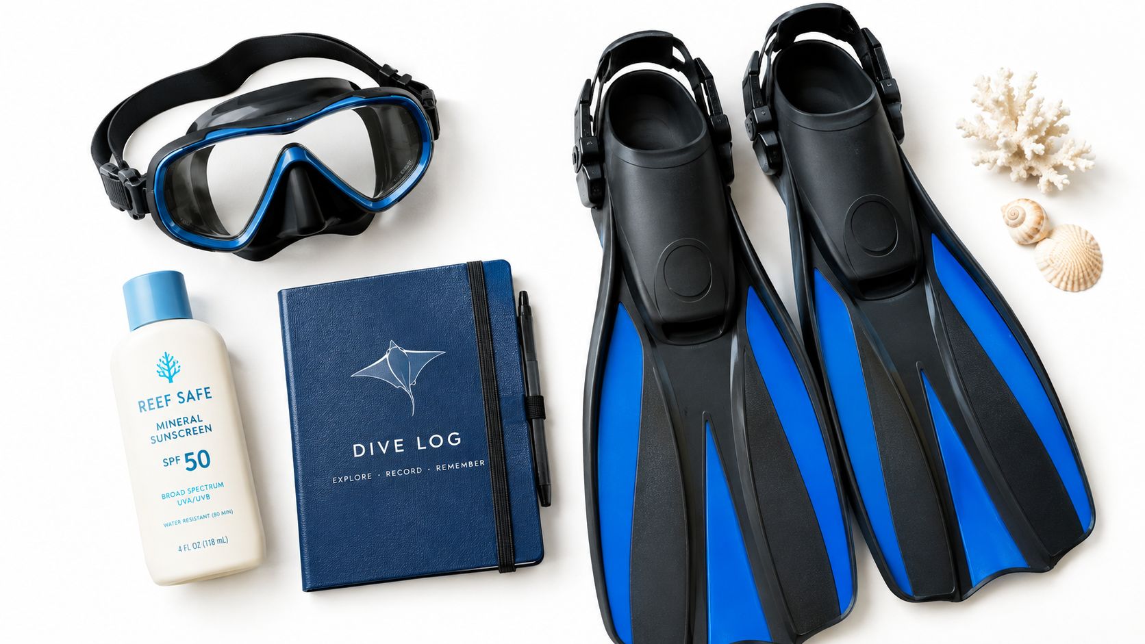 Scuba diving equipment including a blue dive log, sunscreen, a snorkel mask, and flippers on a white background.